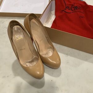 Christian Louboutin Heels. Worn and loved but still great looking and condition!